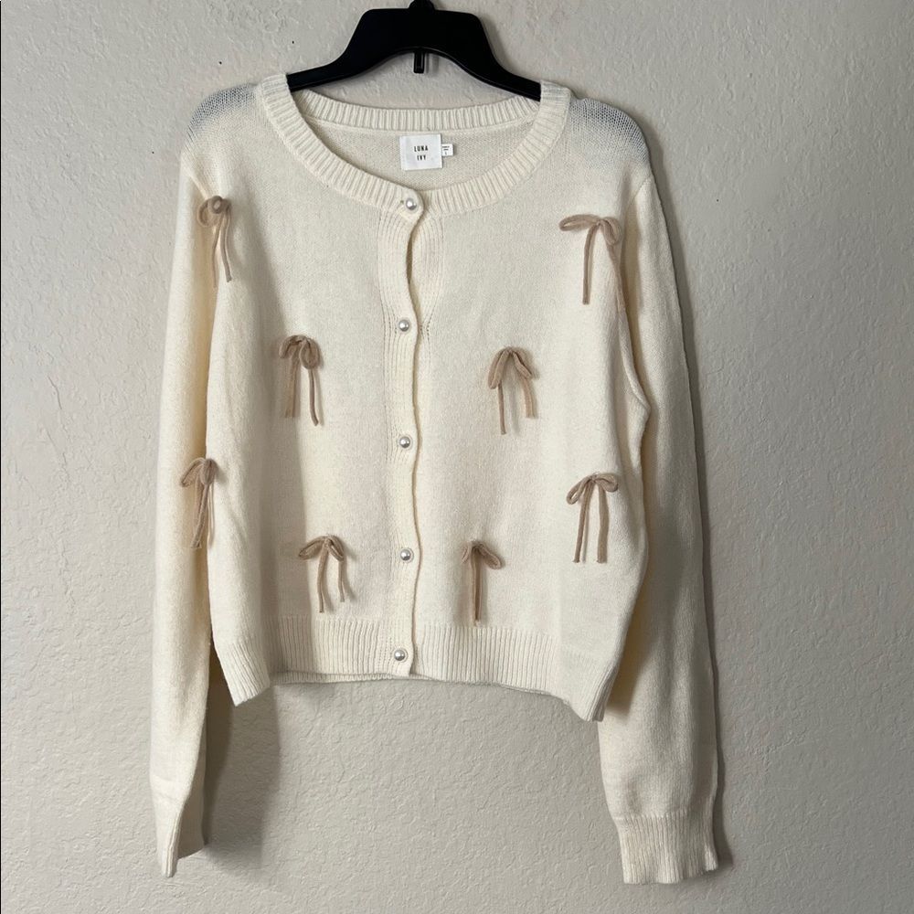 Like New! Luna Ivy 3D Bow Cardigan Sweater Ivory With Pearl Buttons in Size L - Picture 2 of 13